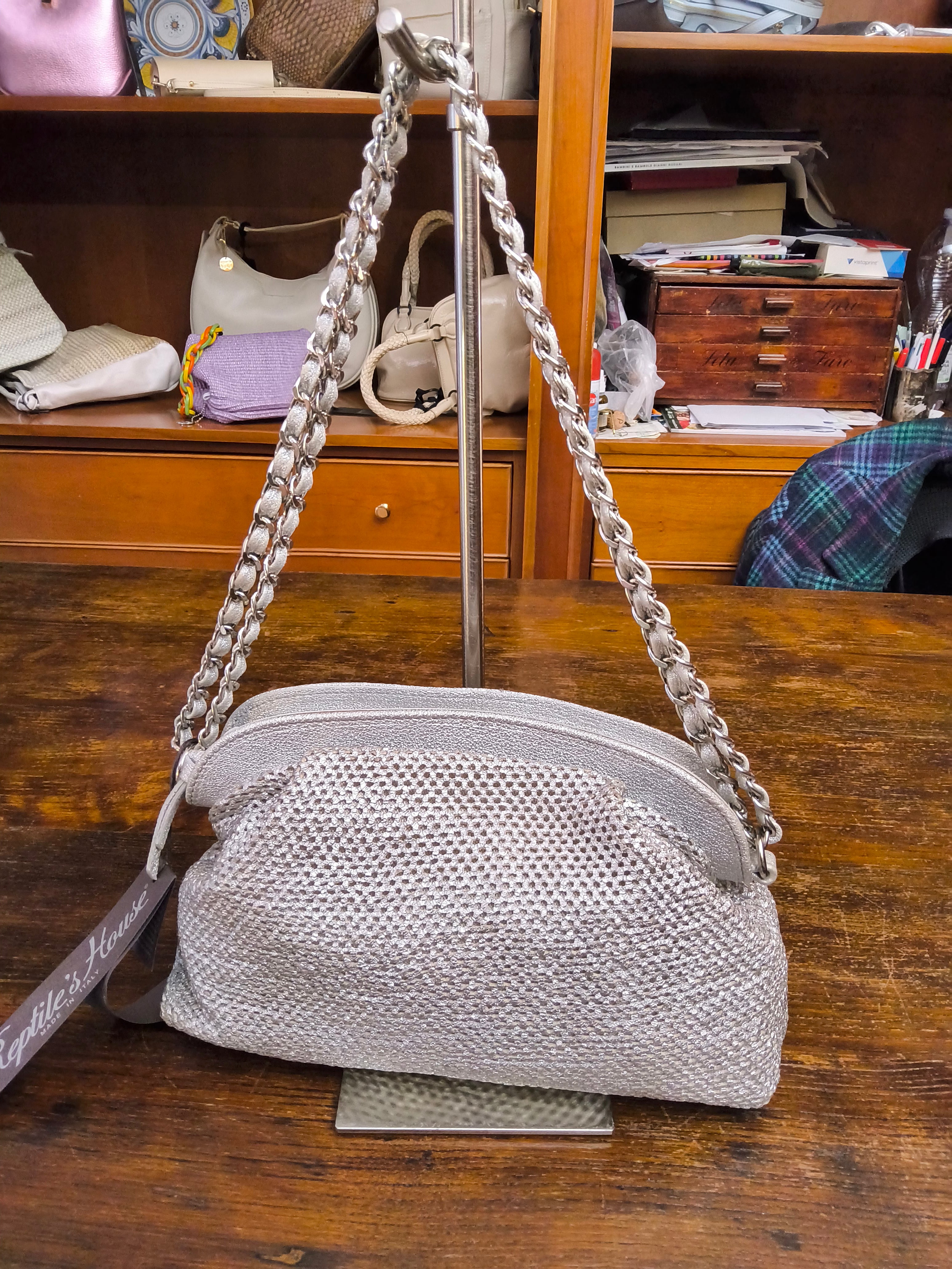 Reptile's House laminated clutch bag