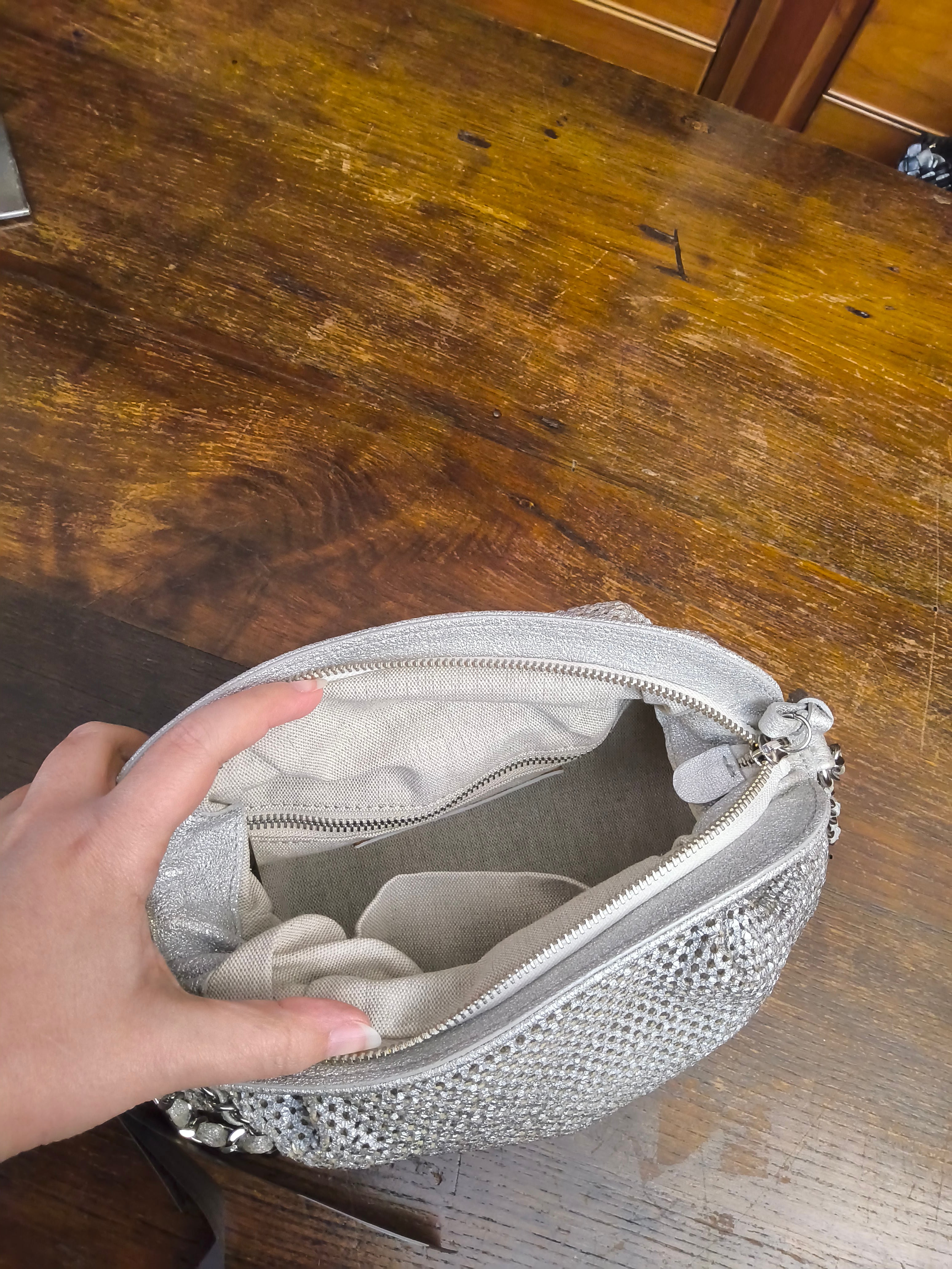 Reptile's House laminated clutch bag